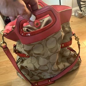 It’s a large Coach purse it’s a very unique style from coach